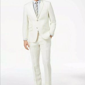 White linen suit by Perry Ellis.